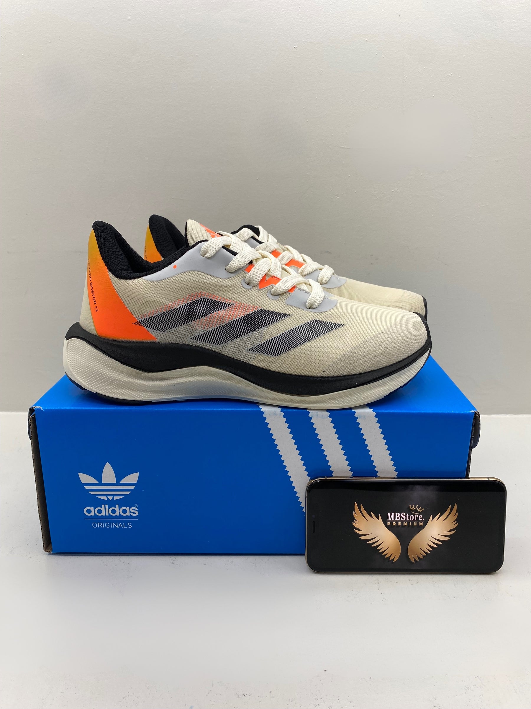 Adizero Boston 12 Off White-Laranja